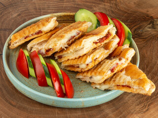 Turkish Tost Toast Sandwich with Melted Cheese and Sucuk served with Salad