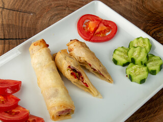Paçanga Böreği turkish traditional food. Fried savoury pastry with cheese and pastirma, Pacanga pastry