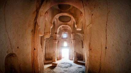 CAPPADOCIA, Ortahisar, Turkey. View of the facade of an ancient cave Orthodox Greek monastery