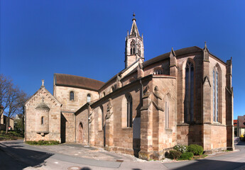 Panoramic view of the medieval monastery church with its ridge turret and its gothic apse in Heilsbronn, Franken region in Germany