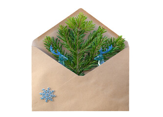 Envelope with a twig of a Christmas tree. On white background .