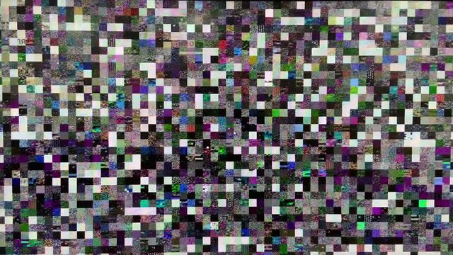 Small colored squares monitor noise. Dynamic video noise