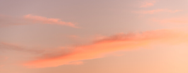 Glowing sky at dusk on a fall evening. Banner, panoramic.