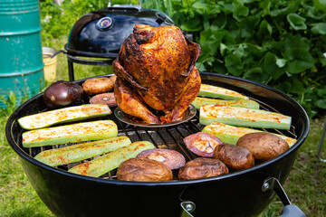 Chicken carcass baked on a kettle grill