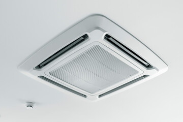 Ceiling сassette air conditioner system in the modern interior.