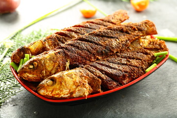 Homemade delicious fried fish from Asian cuisine. 