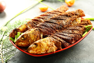 Homemade delicious fried fish from Asian cuisine. 