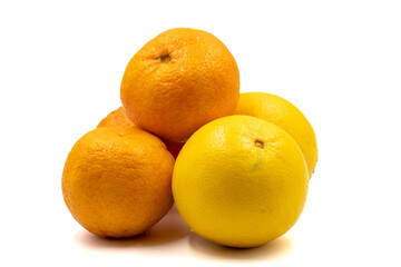 Ripe tangerines and oranges on a white background. Close-up