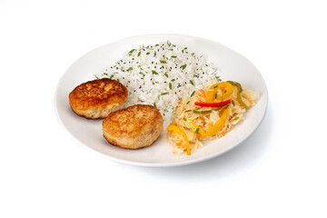 Сlose up Homemade fried Fish Or Chicken Cutlets with rice and salad with sauerkraut on white plate isolated. Gourmet, portion. Banner menu recipe.