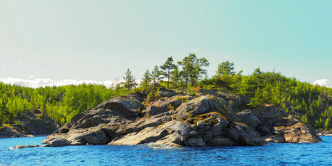 Obraz premium Islands of lake Ladoga, Karelia, Russia. Ladoga skerries, northern nature, panoramic view. Travel to Karelia