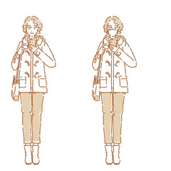 カジュアルファッションの女性　スマホ