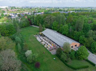 Summer bar Brial in Mortsel Fort 4 a city park near the city of Antwerp. Drone aerial view from above