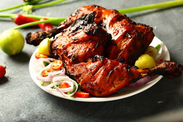 Traditional recipes- Indian tandoori chicken, marinated with spices and herbs. - obrazy, fototapety, plakaty