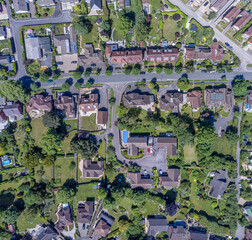 Aerial top down view of urban area urbanisation in local neighbourhood Drone bird eye view of streets and roofs from above in Andover, England, UK