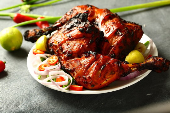 Traditional recipes- Indian tandoori chicken, marinated with spices and herbs.