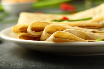 Traditional Indian bread chapattis served with grilled chicken, 