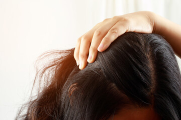 A woman has problems with hair and scalp,she has dandruff from allergic reactions to shampoos. and hair conditioner