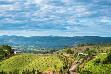 Wind turbines in the mountains with agricultural area, Phetchabun province, Thailand.