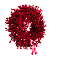 christmas wreath with a bow on white background