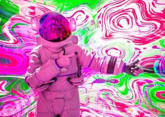 Obraz na płótnie Canvas astronaut is showing the way in a psychedelic background