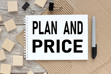 Plan and Price. notepad on a wooden table. Business concept.