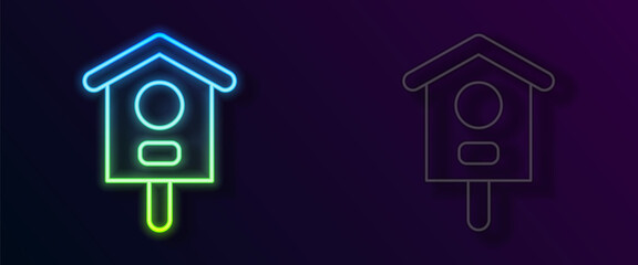 Glowing neon line Bird house icon isolated on black background. Nesting box birdhouse, homemade building for birds. Vector