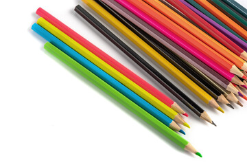 close up of colour pencils isolated on white background