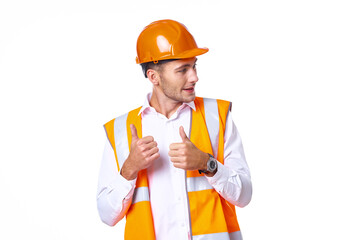 working man in orange uniform posing construction
