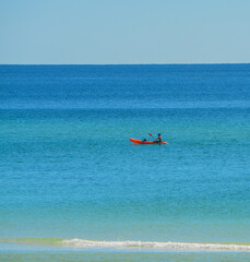 Kayaker off of Miramar Beach on the Gulf of Mexico in South Walton, Florida