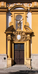 Symmetrical baroque portal at the evangelical city church in the old town of Kitzingen, Germany