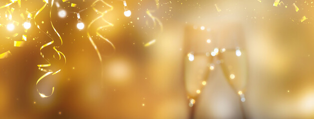 cheers with glasses on blurred golden party background and decorations, celebrations concept for...
