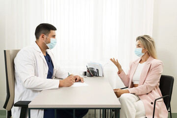 Doctor and female patient during consultation