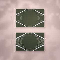 Business card template dark green with mandala white ornament for your brand.