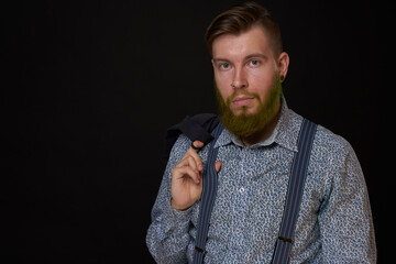 business man in shirt with jacket over his shoulders posing self confidence
