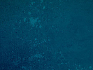 Abstract background of shabby shabby blue paint on wall.