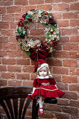 Fototapeta na wymiar Christmas wreath decoration on a wooden door