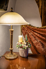 Christmas table composition. Beautiful decoration. Christmas trees, candles, stars, lights and elegant accessories. Merry Christmas and Happy Holidays, Template.