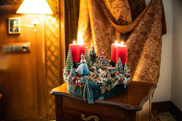 Christmas table composition. Beautiful decoration. Christmas trees, candles, stars, lights and elegant accessories. Merry Christmas and Happy Holidays, Template.