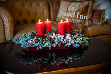 Christmas table composition. Beautiful decoration. Christmas trees, candles, stars, lights and elegant accessories. Merry Christmas and Happy Holidays, Template.