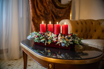 Christmas table composition. Beautiful decoration. Christmas trees, candles, stars, lights and elegant accessories. Merry Christmas and Happy Holidays, Template.