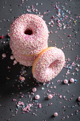 Homemade and sweet pink donuts freshly baked