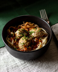 pasta with tomato sauce and meatballs