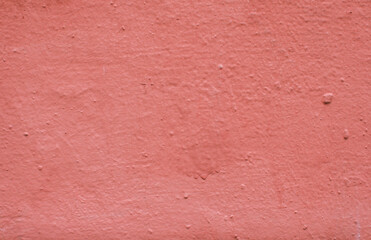 Abstract background from red old plaster on the wall.