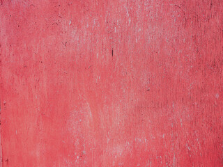 Background from old red paint on the surface