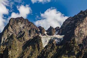 Glacier in the mountains of North Ossetia. Sharp peaks of the North Caucasus mountains.