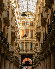 Vertical photograph of the Passage de Lodares, a commercial and residential gallery located in the...