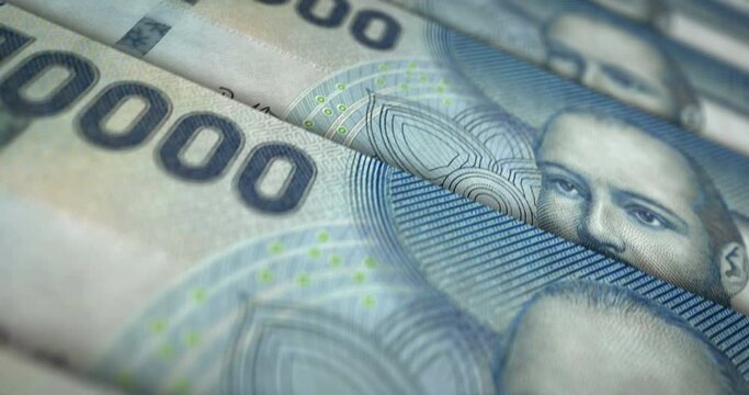 Chile Pesos banknote loop. CLP money texture. Concept of economy, business, crisis, banking, recession, debt and finance. Moving over note. Loopable seamless 3d animation.