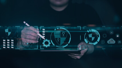 Businessman use laptop or computer with cloud computing diagram and social icons show on virtual screen,Cybersecurity concept, IT engineer working on protecting network against cyberattack from hacker