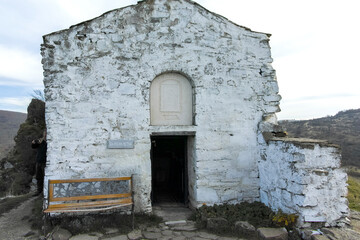 Fototapeta premium Church of Saint John the Baptist at the coast of Pchelina Reservoir, Bulgaria