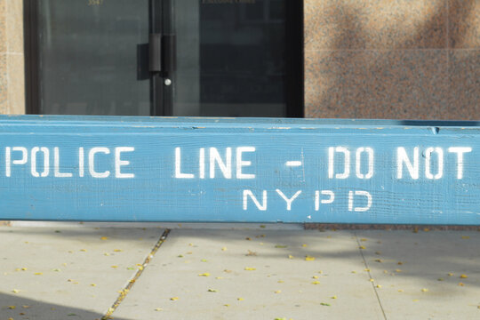 Police Line, Do Not Cross, NYPD Blue Wooden Barricade On Closed Street In New York City